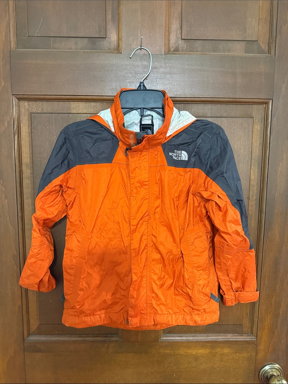 The North Face Orange and Gray Kids Hooded Raincoat